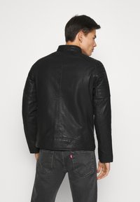 TOM TAILOR Bunda z umělé kůže - black