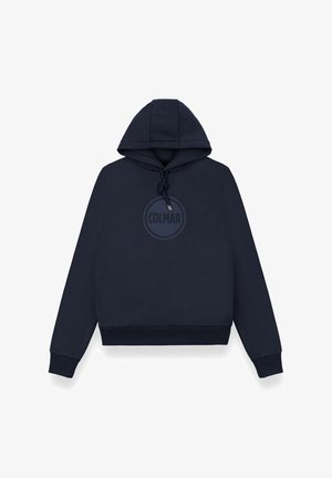 Sweat à capuche bleu marine avec cordon de serrage, arborant un logo circulaire dans une teinte de bleu plus foncée au centre, avec des poignets et un ourlet côtelés.