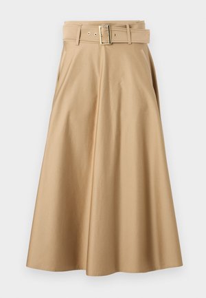 Beige katoenen rok met een hoge taille en ceintuur, wijde silhouet en zijzakken. Voorzien van een gesp in goudkleur en gestikte details.
