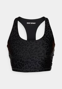 Crni sportski grudnjak s uzorkom leoparda, napravljen od rastezljivog materijala u stilu racerback, s DKNY Sport logotipom na leđima.
