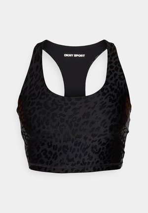 Melnā sporta krūšturis ar leoparda rakstu, izgatavots no elastīga auduma ar racerback stilu un DKNY Sport logo aizmugurē.