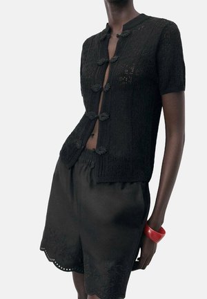 Strickjacke - black