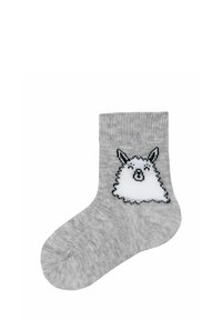 Calzini alla caviglia di cotone grigio con un design che raffigura un cane fluffy bianco con accenti neri e dettagli rosa, texture lavorata a maglia e forma della punta arrotondata.
