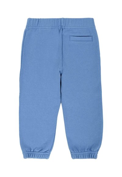 Pantaloni da felpa blu in cotone con cintura elastica, caviglie a coste e una piccola tasca a toppa sul retro. Texture liscia, design casual.