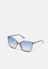 Guess Sončna očala - shiny beige / blu mirror