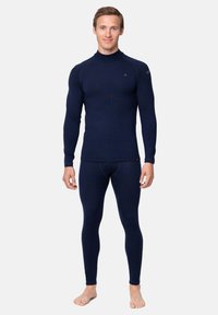 Marineblaues thermisches Basisschichtset, Langarmoberteil mit hohem Kragen und enganliegenden Leggings, aus dehnbarem, leichtem Gewebe.