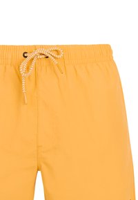 Costume da bagno giallo con vita elastica e coulisse bianca decorata annodata a fiocco al centro davanti.