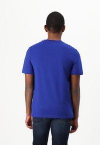 Tommy Hilfiger ESSENTIAL V NECK - Basic T-shirt - wedge blue
