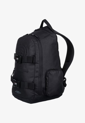 Black backpack made of durable fabric, featuring multiple zippered compartments, adjustable straps, and front buckle closures for security.
