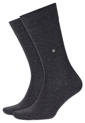 Calzini di cotone grigio scuro con una texture liscia, bordo a coste e un piccolo logo circolare su un lato. Lunghezza classica a metà polpaccio.