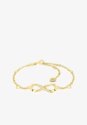 Gold bracelet featuring an infinity symbol with six embedded clear stones, accented by small heart-shaped links and a clasp.