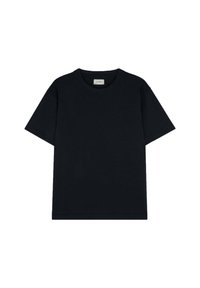 Camiseta de algodón negra con un corte clásico de cuello redondo y mangas cortas, con un ajuste relajado y sin patrones ni acentos visibles.