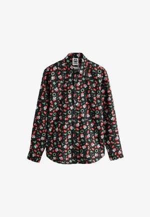 Langærmet skjorte i sort bomuld med et festligt mønster af snemænd, juletræer, gaver og slikstokke i rødt og grønt.