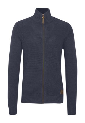 Maglione zip-up blu navy con un design a maglia testurizzata, colletto e polsini a coste, dotato di una cerniera e un logo a contrasto.