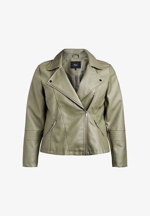 OLIVZĀLĪGA ĀDIJUMS, KAS IEBUVO DEZFOLDU, ASIMETRISKĀ CIEŠO ĒDU AR DIVIEM PRIEKŠĒJIEM CIEŠO POGU UN ŠŪTU AKCENTIEM UZ PIEDURKNĒM.