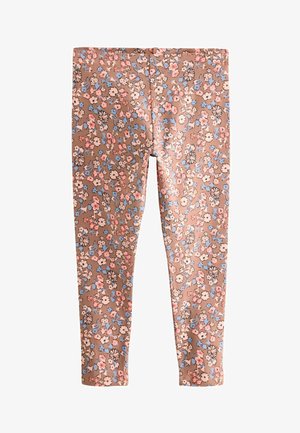 Leggings en tissu doux avec un fond marron, ornés d'un motif floral en rose, blanc et bleu. Conception ajustée à la cheville.