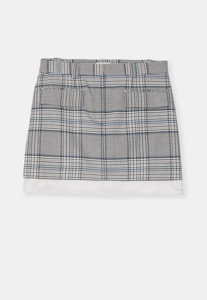 Ruuduline mini-seelik musta, valge ja sinise värviga. Omab kahte esist taskut ja ühtlast valget äärt. Kerge kangas sujuva tekstuuriga.