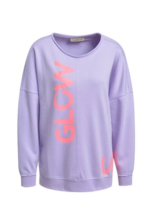 Lavender long-sleeve sweatshirt with pink vertical "GLOW" text on front and a small pink partial letter near the hem on white background.