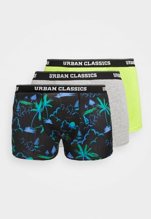 Három pár boxer: az egyik fekete alapon kék pálmafás mintával, egy szürke, és egy neon sárga, mindegyik elasztikus Urban Classics derékszíjjal.