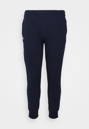 PLUS - Pantaloni sportivi - navy blue
