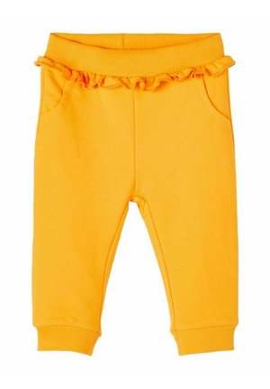 Gule bomuldsbukser med ribbet taljebånd, flæsedetalje øverst og sidelommer; ben, der smalner, med ribkantsmanchetter ved anklerne.