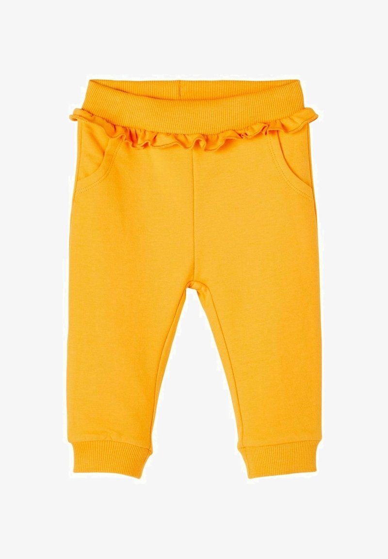 Pantalon en coton jaune avec une ceinture côtelée, un accent froncé en haut et des poches latérales ; jambes fuselées avec des poignets côtelés aux chevilles.
