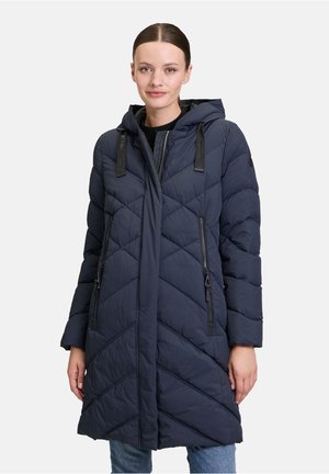 Navy blue padded coat with a hood, featuring a chevron pattern, two zippered side pockets, and adjustable drawstrings on the hood.