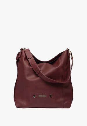 Burgundy leather hobo bag with a slouchy shape, a wide strap, gold-tone hardware, and a front panel featuring textured accents.