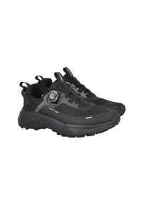 Zapatillas deportivas negras con parte superior de malla, suela de goma texturizada y un dial de ajuste circular. Presentan una franja reflectante y un talón reforzado.