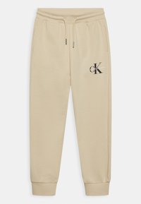 Calvin Klein Jeans MONOGRAM LOGO PANTS UNISEX - Träningsbyxor - muslin