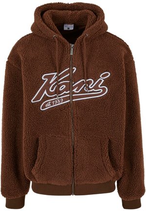 Brown fleece hoodie with a zip front, large pockets, and white logo detailing. Features drawstring hood and ribbed cuffs and hem.
