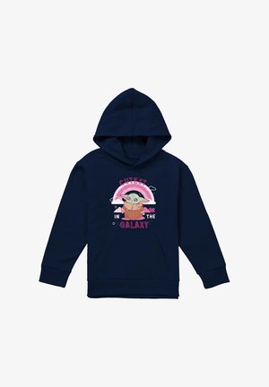 Marineblauer Kapuzenpullover mit Fronttasche, auf der Brust ein grüner Alien-Charakter unter einem rosa Regenbogen und dem Schriftzug "Süßester der Galaxie".