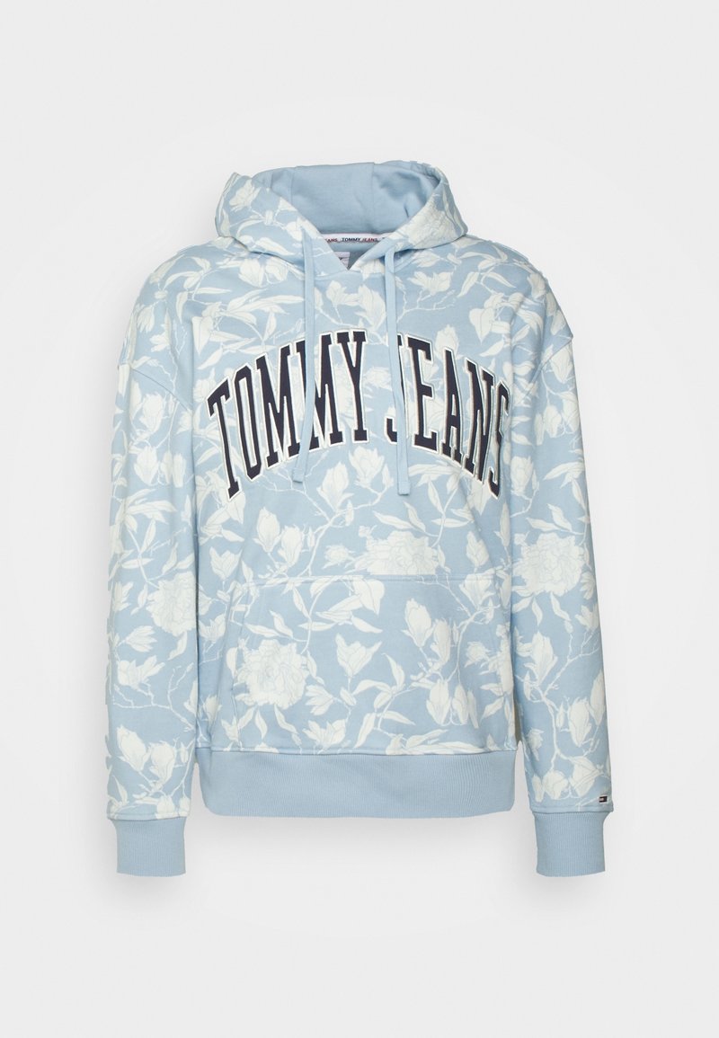 Felpa con cappuccio di colore azzurro chiaro con motivo floreale, scritta "TOMMY JEANS" in borgogna sul davanti, polsini e orlo a coste. Materiale misto cotone.