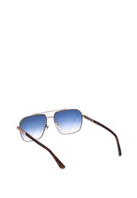 Lunettes de soleil à monture métallique avec verres carrés dégradés bleus et branches marron, vues de dos sur fond blanc.