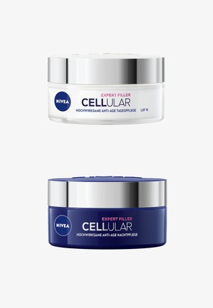 Zwei Nivea CELLular Expert Filler Anti-Aging-Cremes, weiße Tagescreme und dunkelblaue Nachtcreme, beide mit silbernen Deckeln.