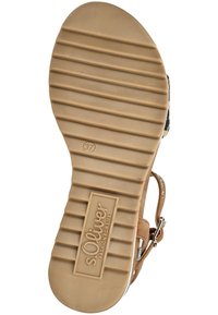 Tan rubber sole with horizontal grooves, features branding "s.Oliver," size 37 printed, along with a brown strap attached to a patterned upper.