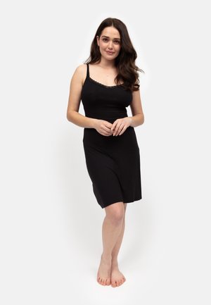 Schwarzes ärmelloses Kleid aus weichem Stoff, mit Spitzenbesatz entlang des Ausschnitts und einer lockeren A-Linien-Silhouette.