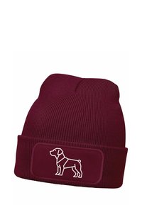 Burgundy knit beanie with ribbed texture. Features a rectangular patch with a white line drawing of a dog on the front.