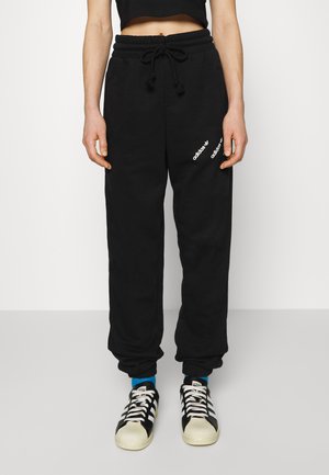 TRACK PANTS - Pantalones deportivos - black