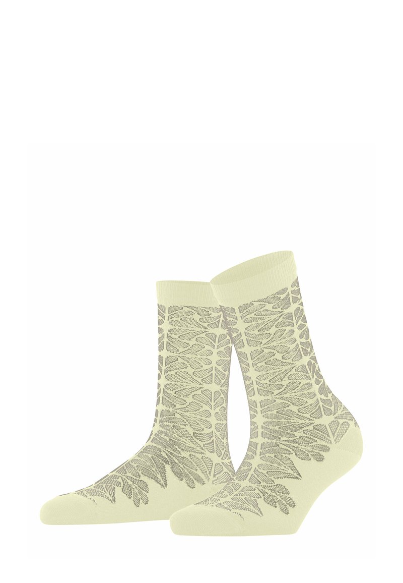 Jasnokremowe skarpetki z szarym wzorem liści rozciągającym się od palców do mankietów, ułożone obok siebie na białym tle.