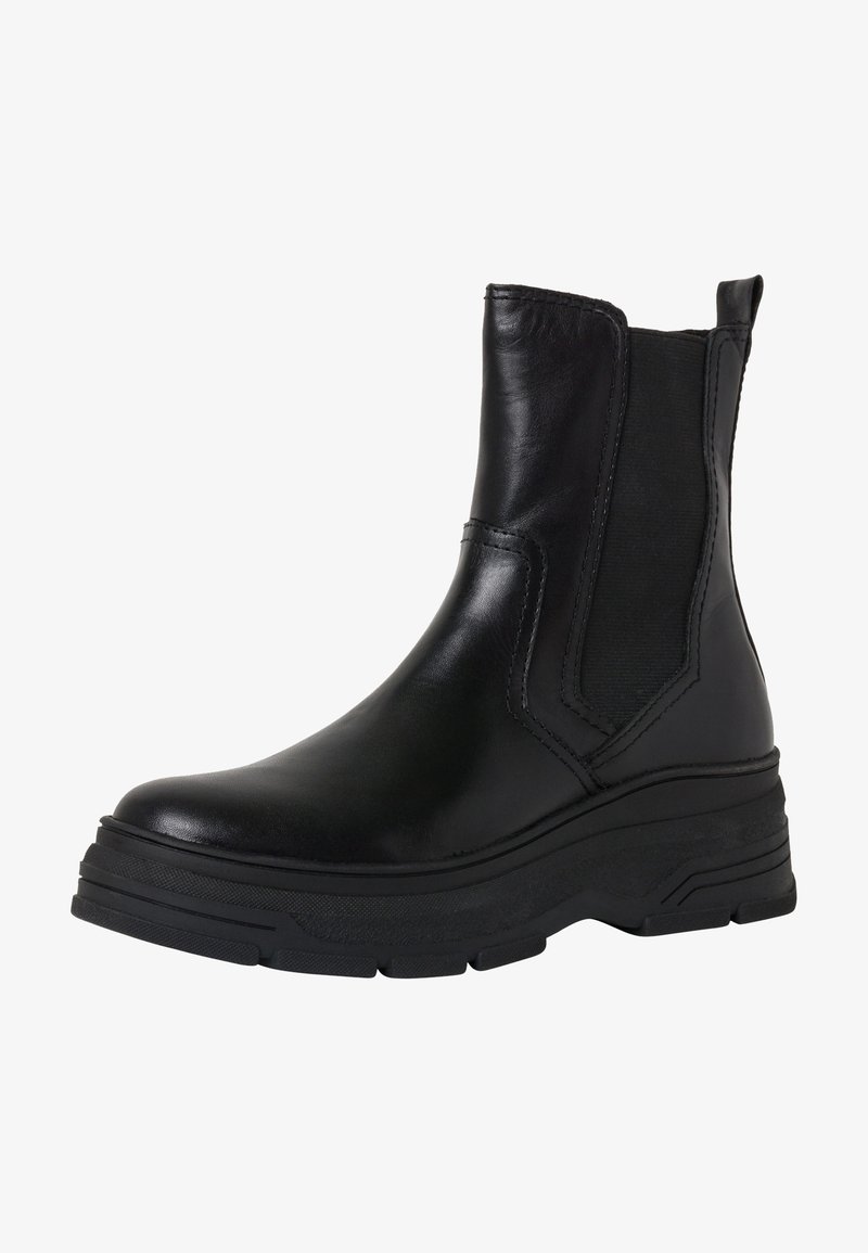Bottine en cuir noir avec panneaux latéraux élastiques, bout arrondi et semelle en caoutchouc texturée. Dotée d'un talon chunky légèrement surélevé.