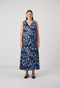 Maxikjole med blomsterprint i lilla, blått og grønt. Har V-hals og er laget av lett stoff.