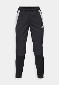 Black athletic pants with a tapered fit, featuring gray side panels, an elastic waistband, and an Adidas logo on the left thigh.