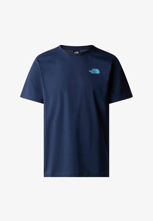 Temno modra bombažna majica s kratkimi rokavi. Ima majhen turkizni logotip na prsih in klasičen krožni ovratnik. Gladka tekstura.