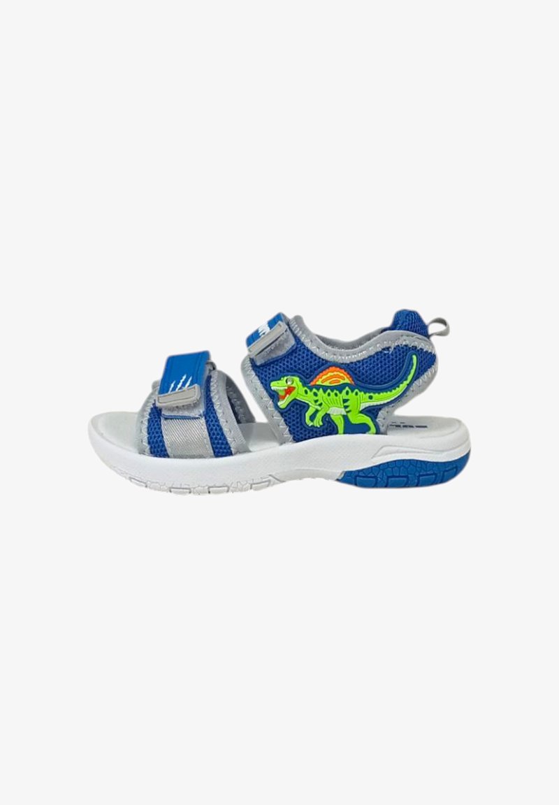 Sandali blu per bambini con cinturini grigi, caratterizzati da un design con dinosauro verde, suola in gomma testurizzata e chiusure in Velcro per una vestibilità regolabile.