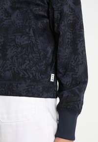 Nike Sportswear Lehká bunda - dark blue