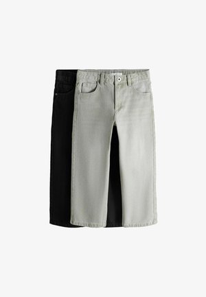 Kaks paari teksaseid, laid laiali: üks must ja üks helehall. Mõlemal on sirge säärega disain, viis taskut ja nööpidega sulgemine.