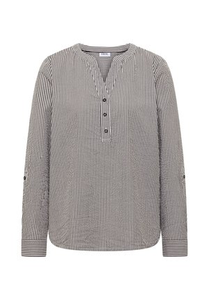 Blouse à manches longues rayée verticalement en noir et blanc, col rond, trois boutons sur le devant et manches avec poignets.