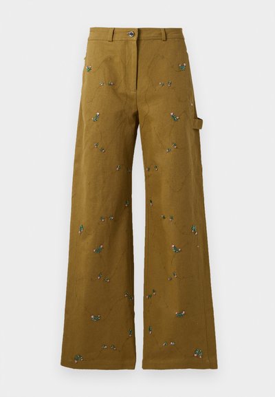 Wide-leg pants in olive green fabric with floral embroidery. Features a button closure and side pocket. Textured stitching detail throughout.