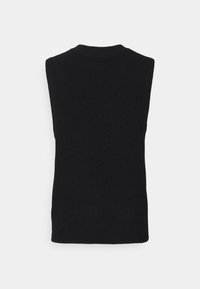 Gilet sans manches en maille noire avec un col rond, montré de dos sur un fond blanc.